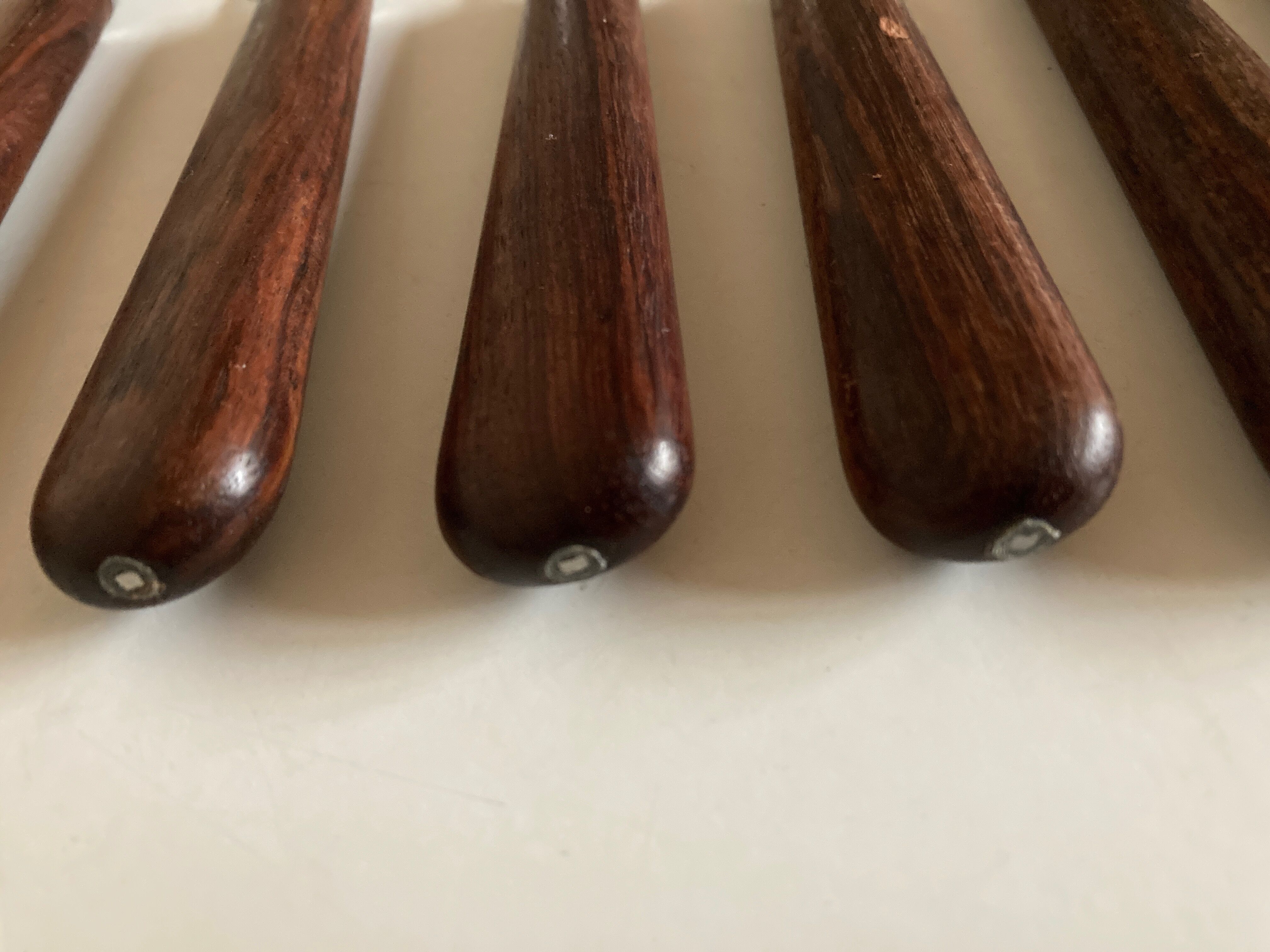 Set of 9 knives with mid century rosewood handle