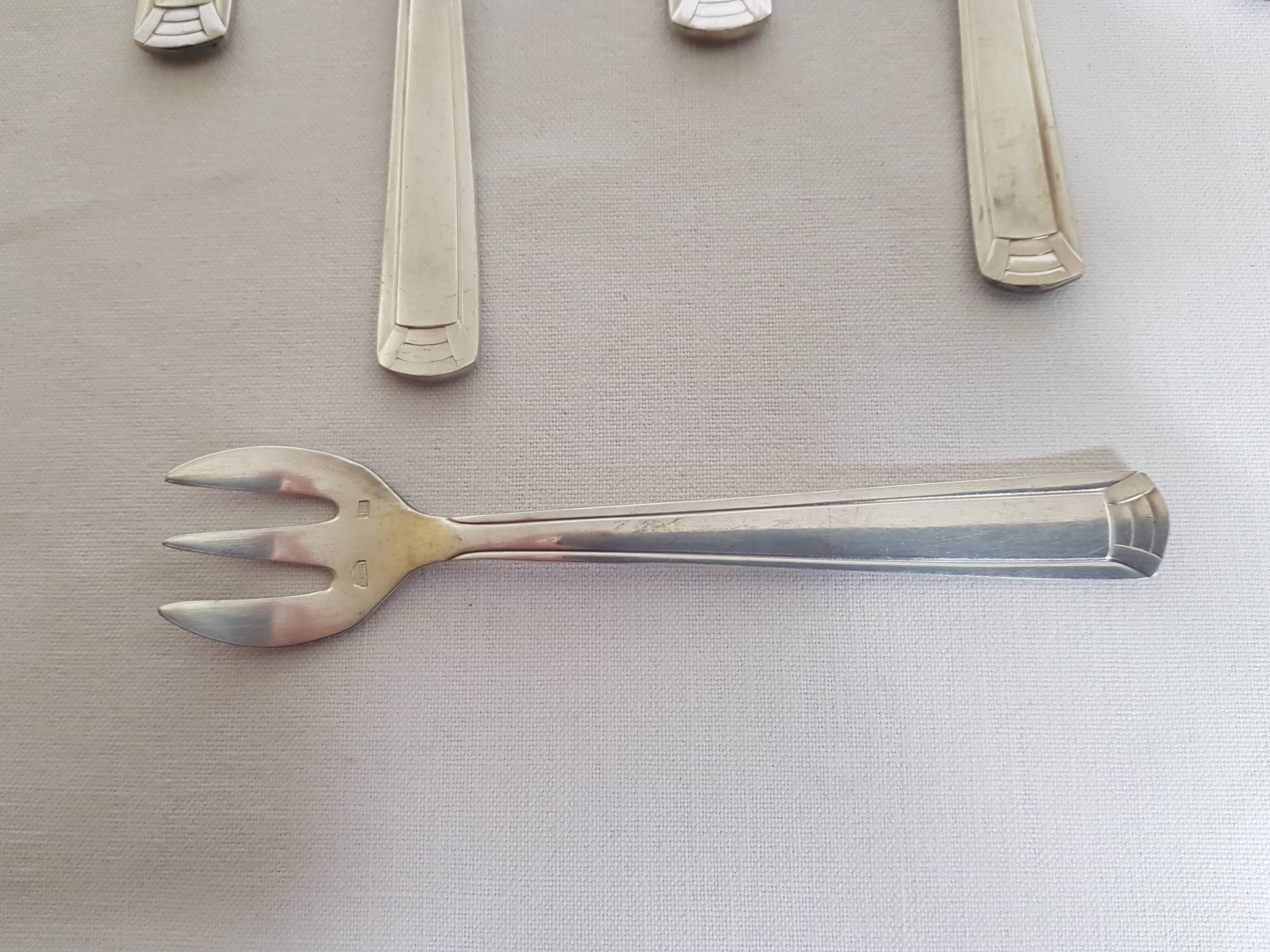 Six art deco silver metal oyster forks