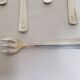 Six art deco silver metal oyster forks