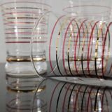 Set of 7 vintage glasses with gold and red edges from the 50s/60s