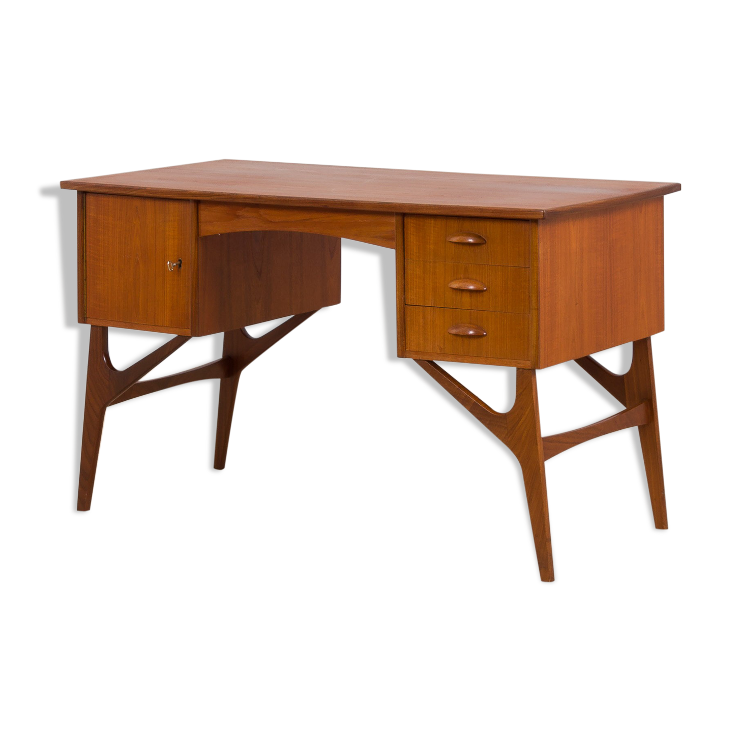 Danish mid century teak desk on sculptural base, 1960s.