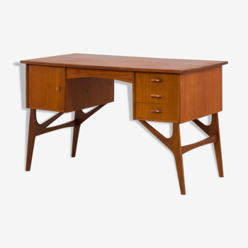 Danish mid century teak desk on sculptural base, 1960s.
