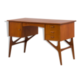 Danish mid century teak desk on sculptural base, 1960s.