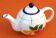 Cafetière / théière forme boule  faïence à décor de fruits