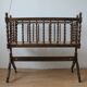 Old Vintage cradle with balance on wheels