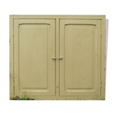 old façade of beige cupboards