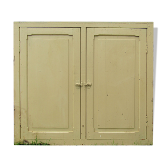 old façade of beige cupboards