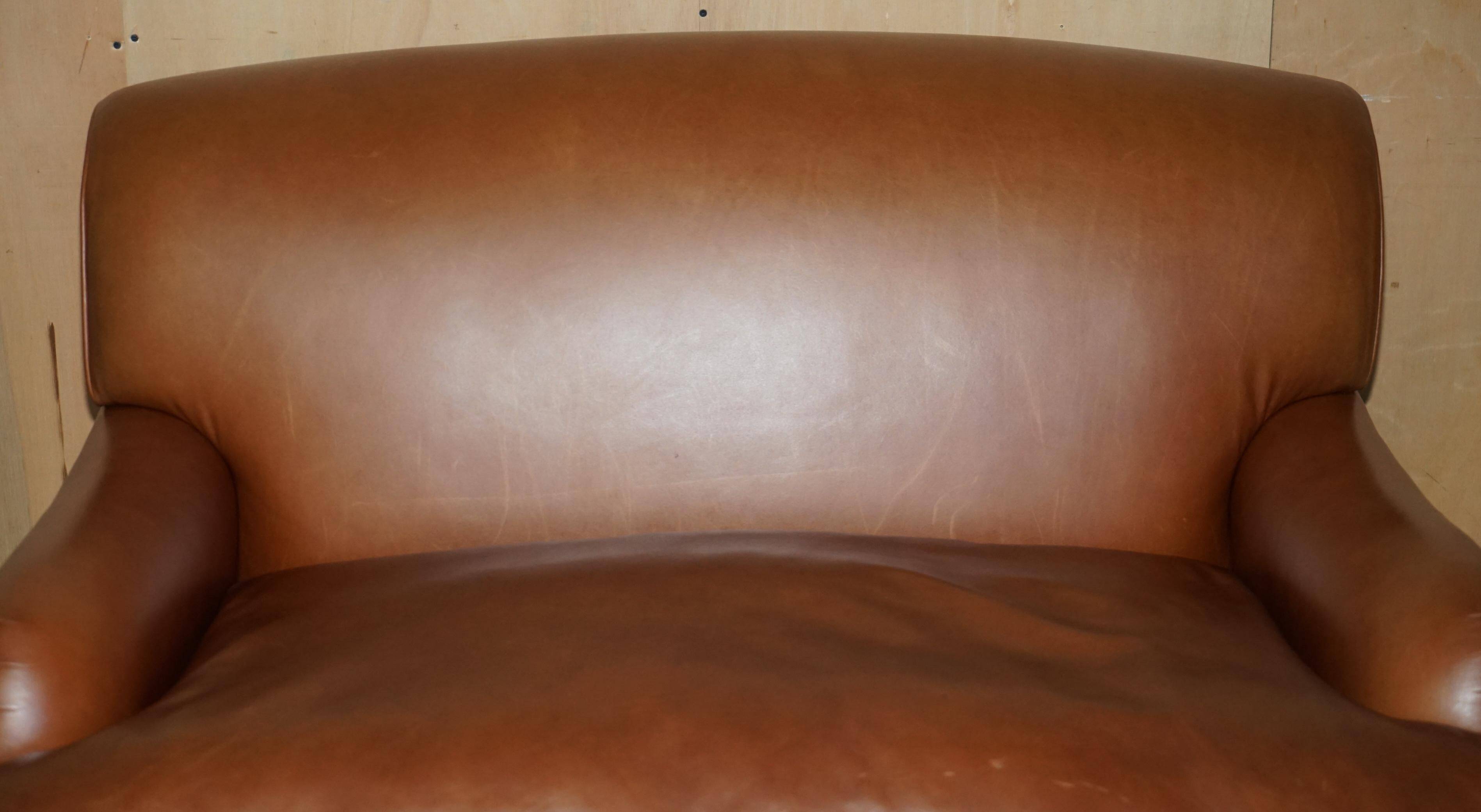 Two-seater leather armchair in Howard style by George Smith.
