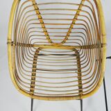 A pair of wicker chairs, 1970s