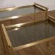 Italian nesting tables in brass and glass from the 1970s.