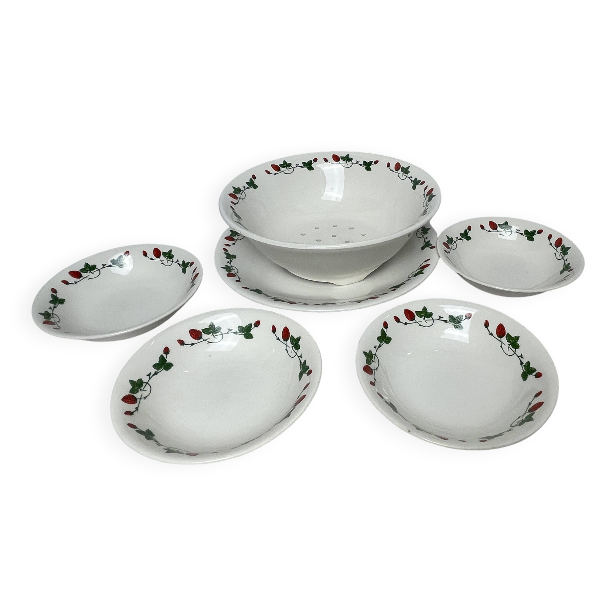 GIEN, strawberry draining bowl and earthenware dishes, 20th century