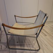 Scandinavian living room armchair in tubular chrome and leather