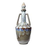 Vintage stoneware bottle with flamed glaze, France 1950-1970.