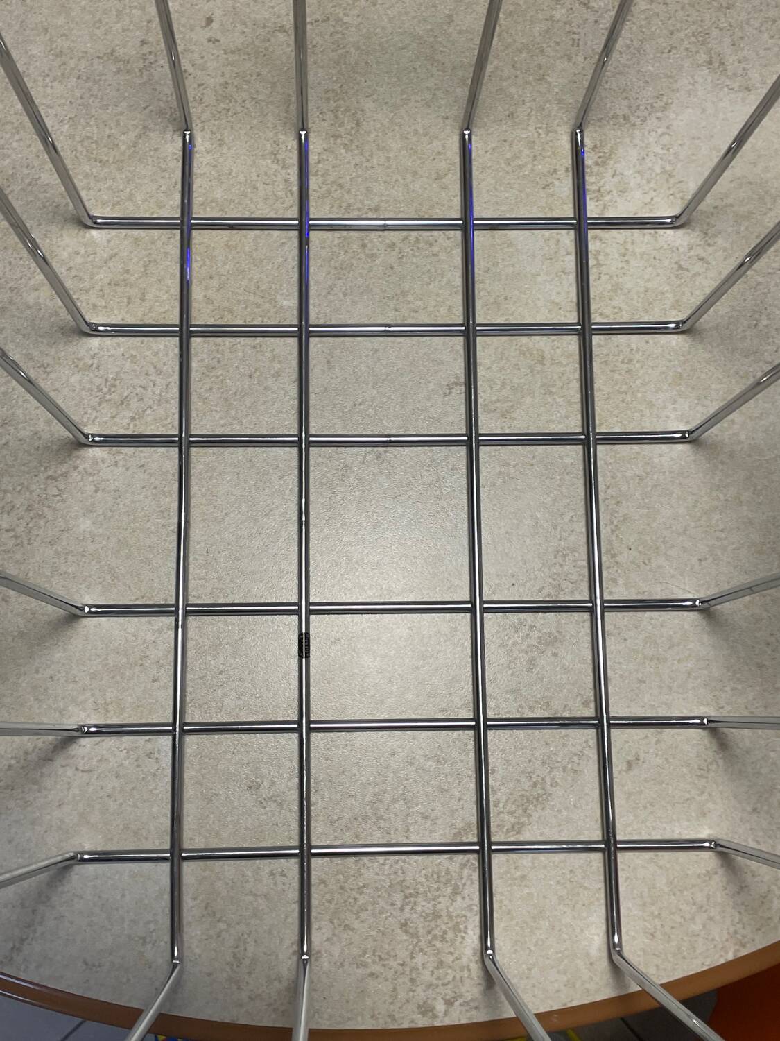 TMP magazine rack by Willy Glaeser, stamped