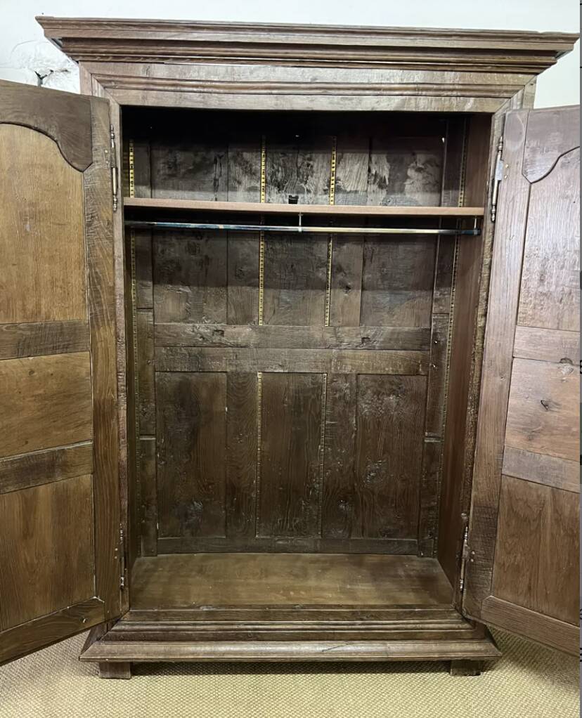 Louis XV carved wooden wardrobe from the 18th century