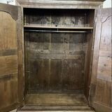 Louis XV carved wooden wardrobe from the 18th century