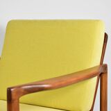Scandinavian restored armchair, original 60s icon, yellow, teak