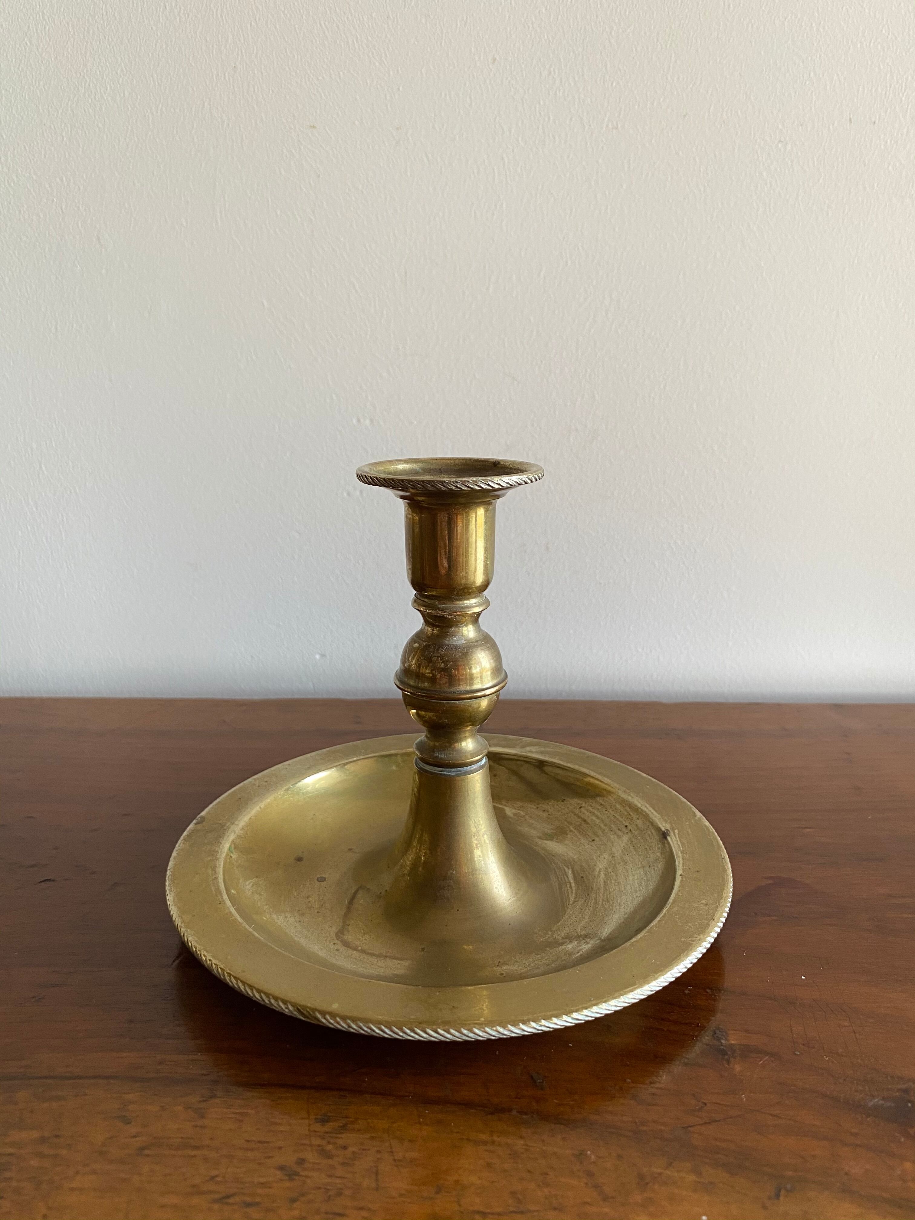 Antique brass candle holder