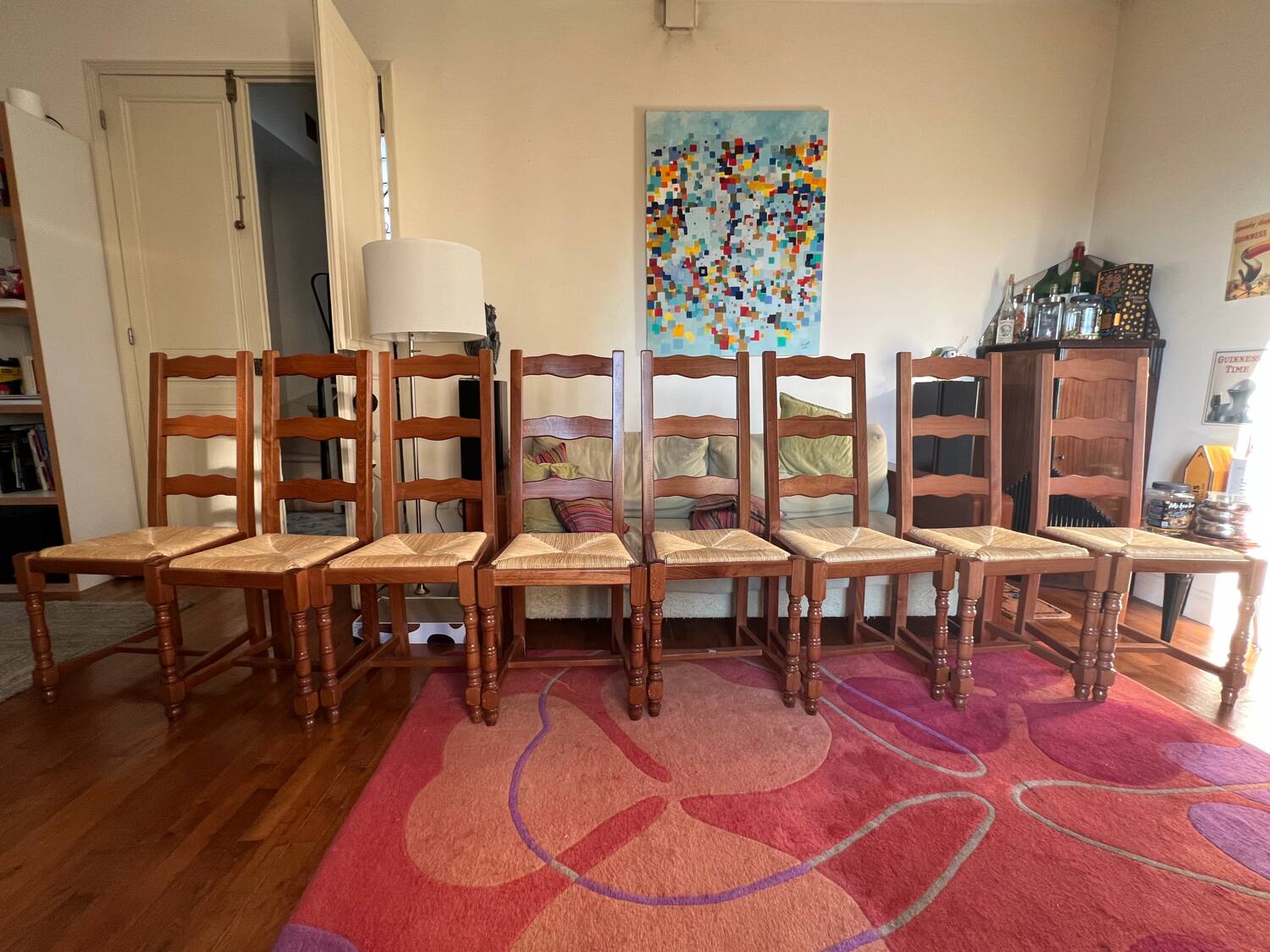 Set of 8 solid varnished oak chairs in excellent condition