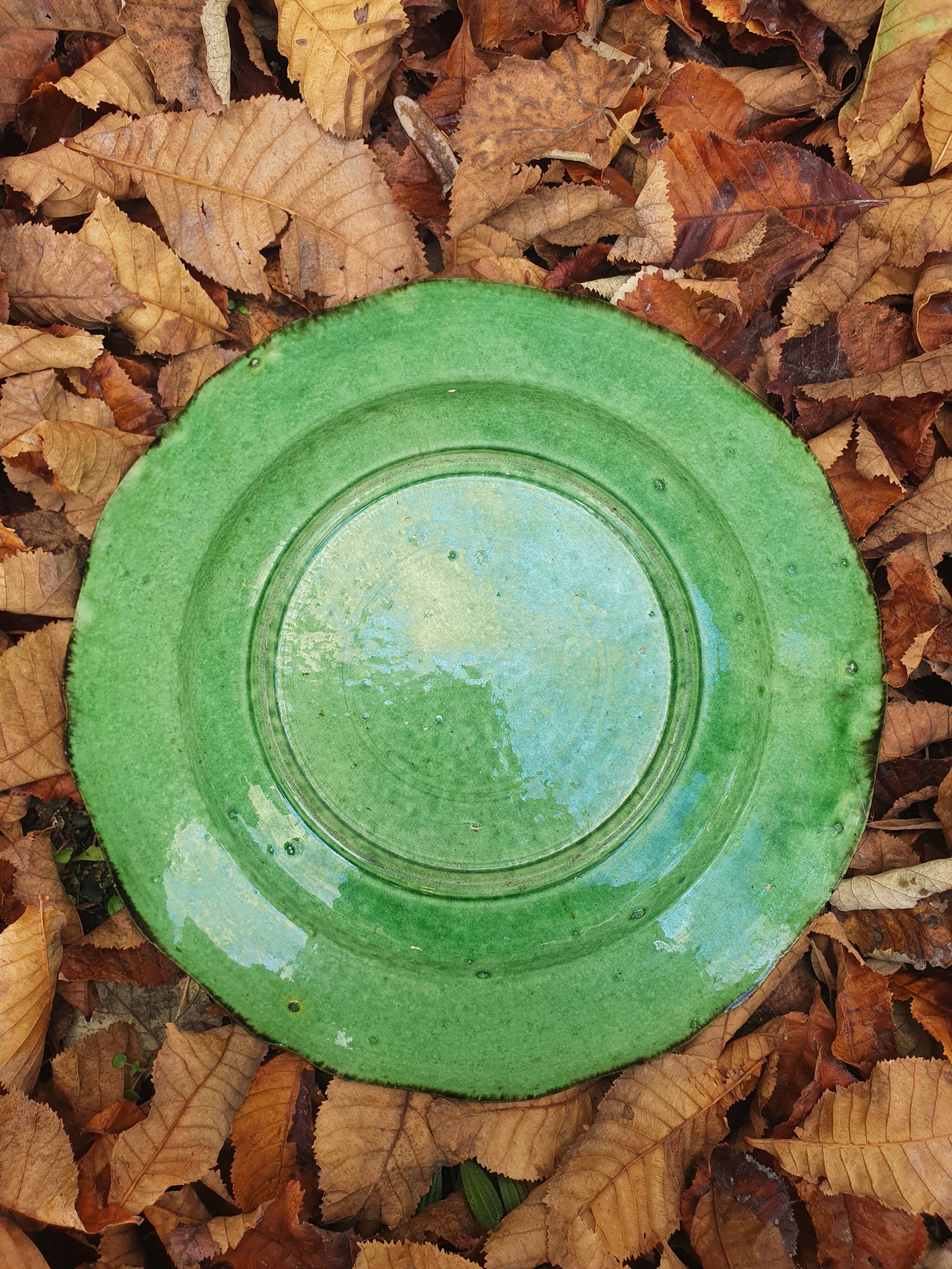 Hollow plate in green glazed clay Etienne Noël