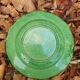 Hollow plate in green glazed clay Etienne Noël