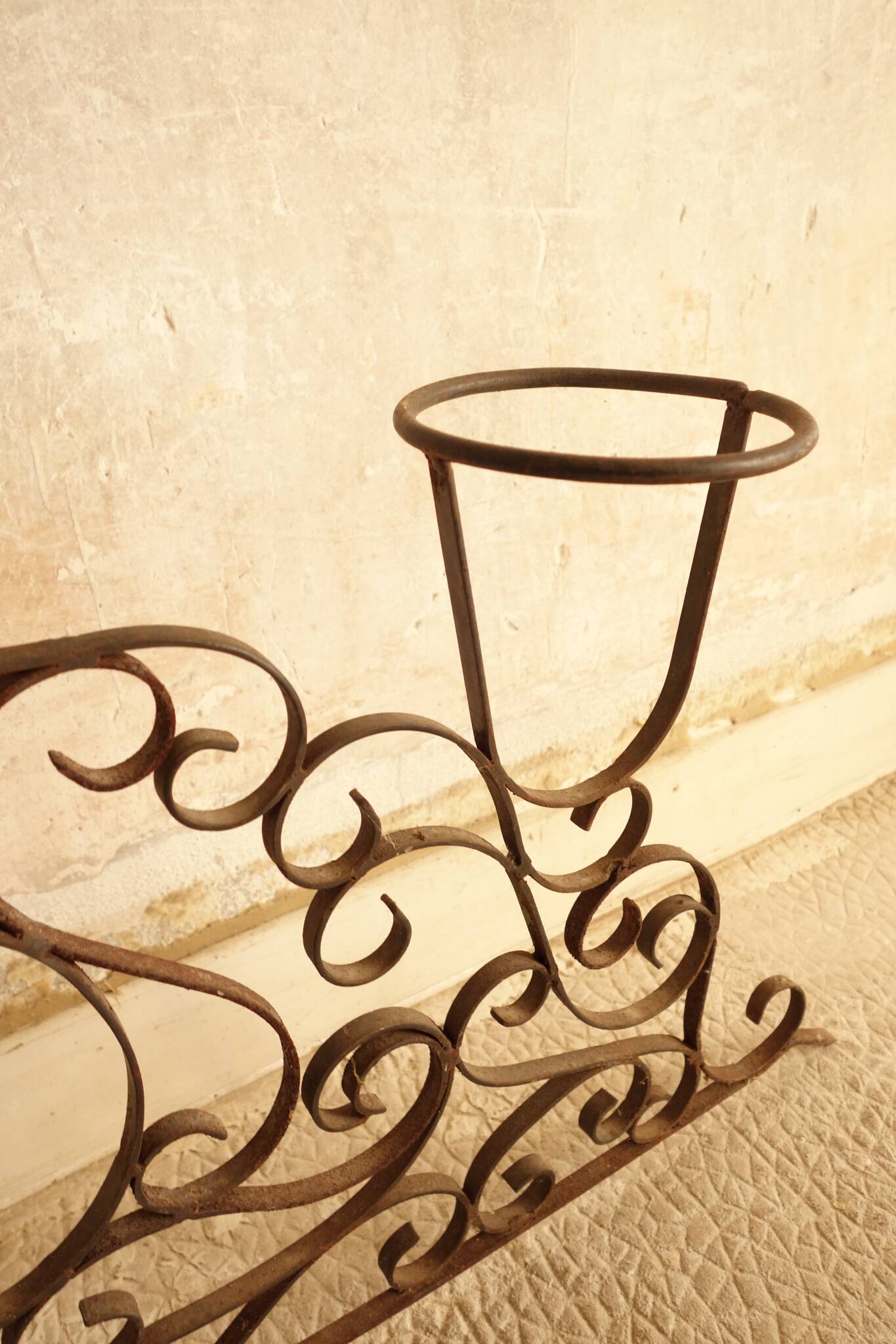Antique wrought iron plant stand