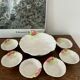 Vintage hollow dish and its 6 strawberry slip bowls
