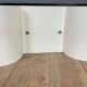 Coffee table in white lacquered steel and glass top 1970s