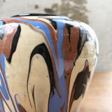 Vase dripping in varnished earth