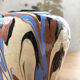Vase dripping in varnished earth
