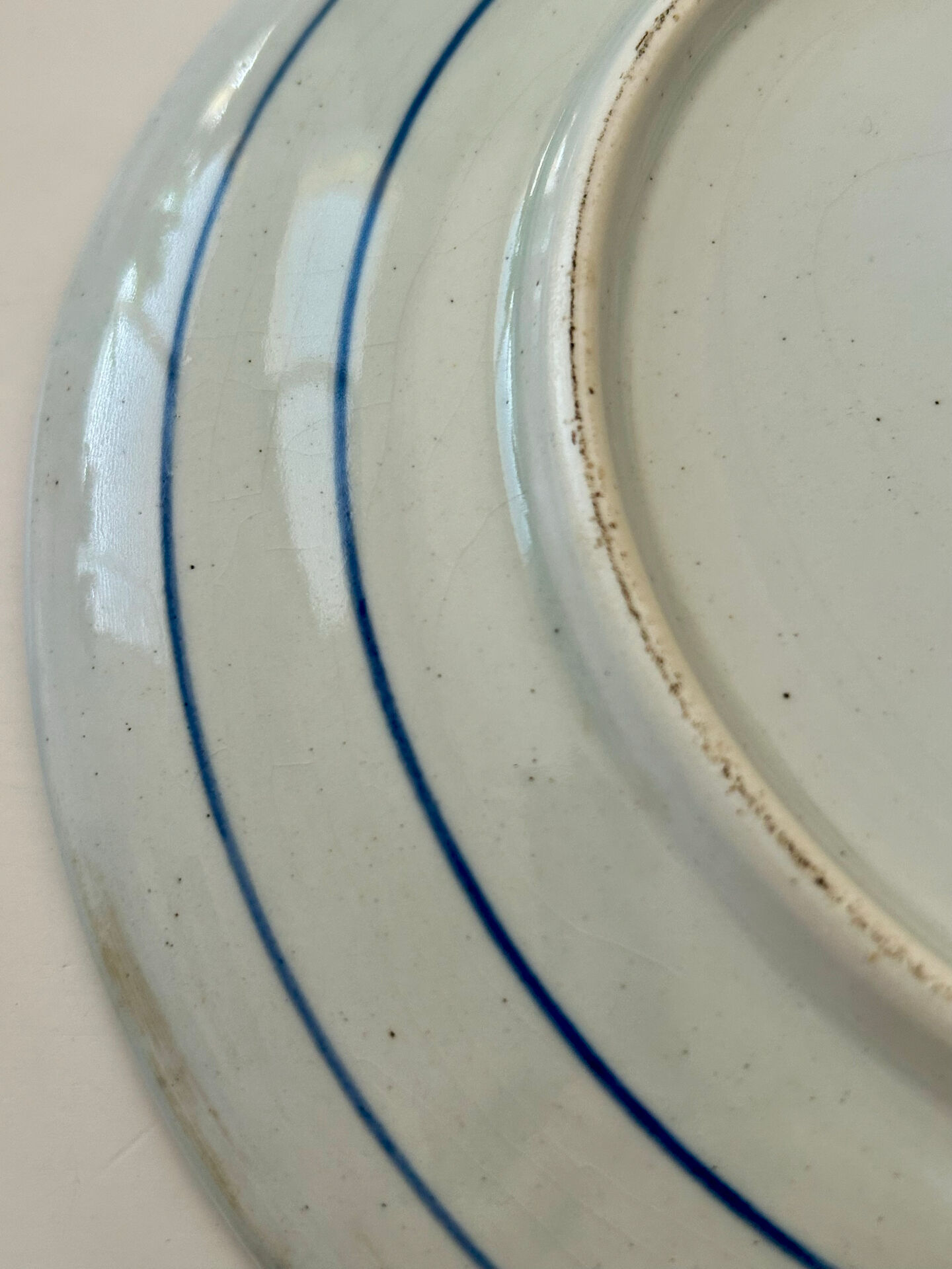 Old wall plate in blue Delft pottery