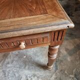 Antique French walnut table with six drawers, parquet top, early 20th century.