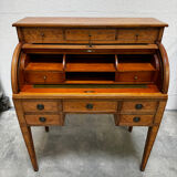 Cylinder desk with marquetry featuring a crosshatch design.