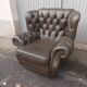Pair of Chesterfield armchairs with footrest