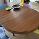 Butterfly table in teak with 2 extensions.