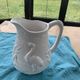 Carafe the heron in white glazed ceramic slipware.
