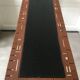 Perforated sheet metal and wood console