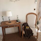 Renovated Voltaire armchair with boucle fabric.