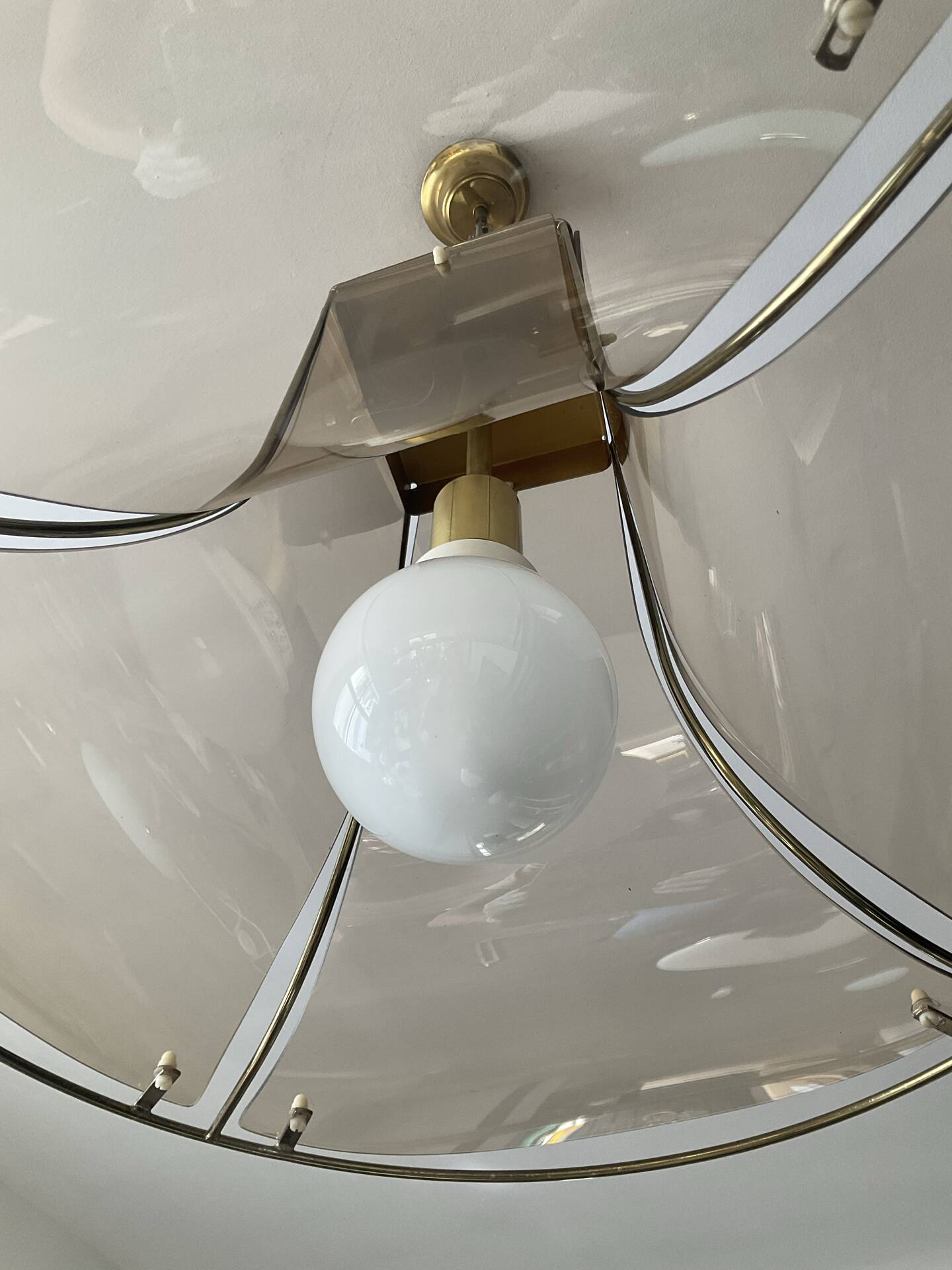 Italian suspension lamp in smoked glass and brass from the 1970s.