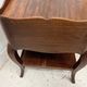 Louis XV style bedside table in solid walnut, 20th century.