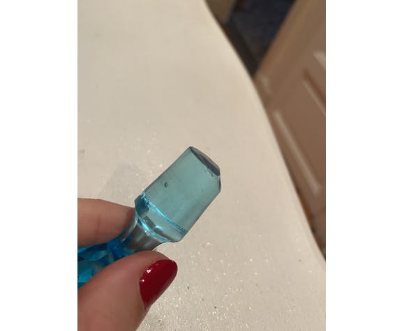 Blue carafe with vintage button