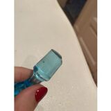 Blue carafe with vintage button