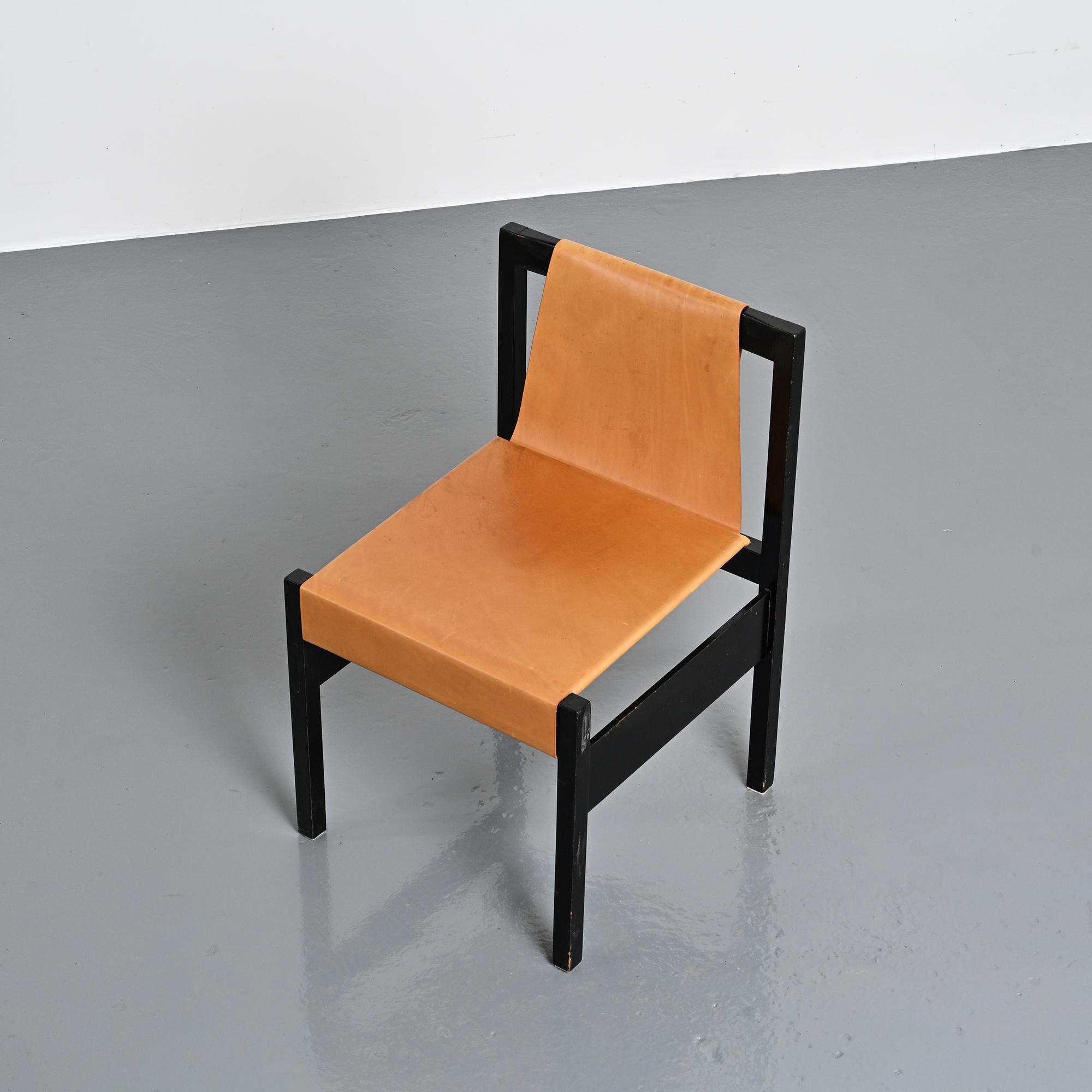 Set of black lacquered wooden chairs with leather, Swiss architect's work, 1980s.