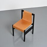 Set of black lacquered wooden chairs with leather, Swiss architect's work, 1980s.