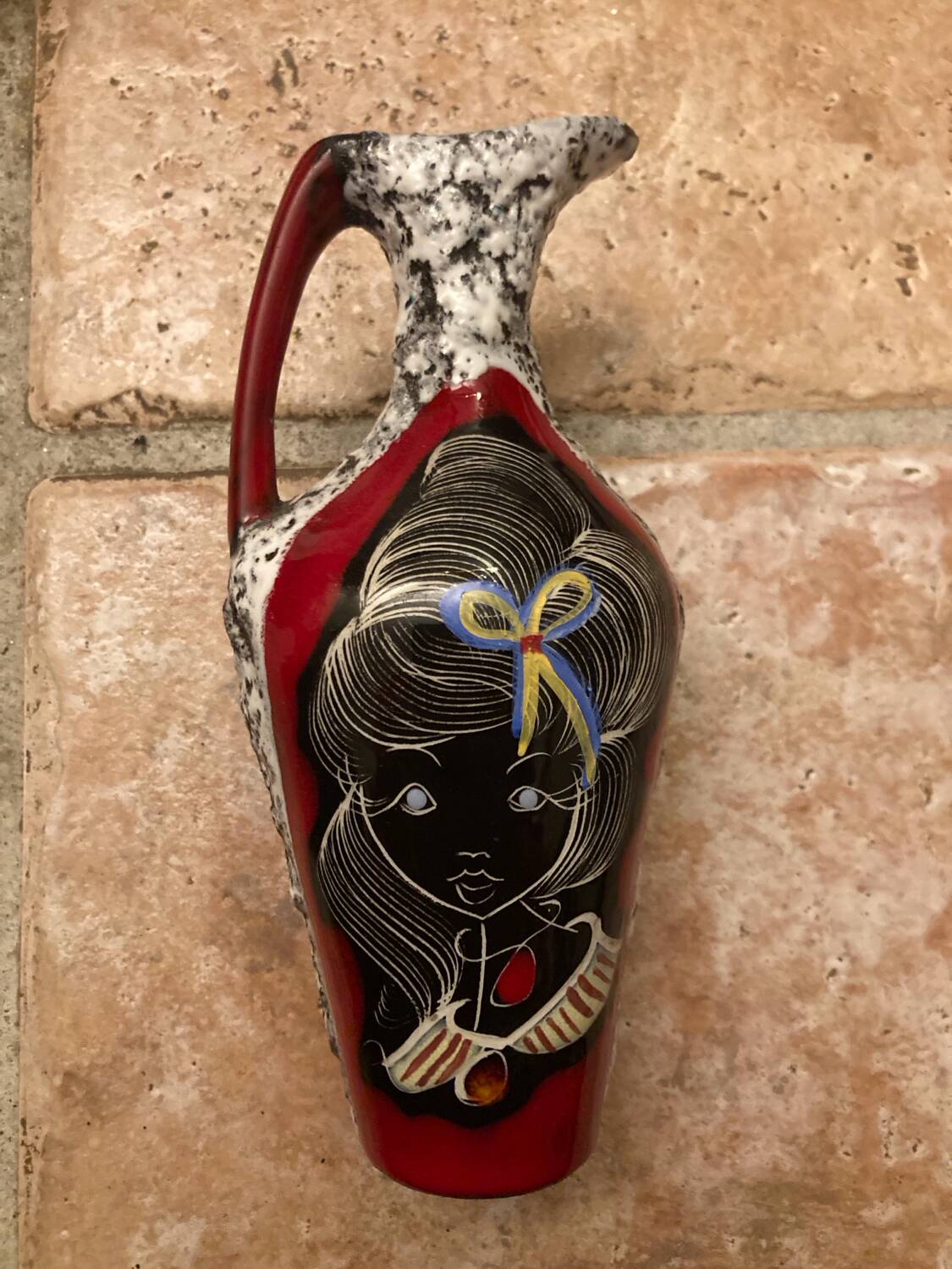 Vintage vase, made of glazed lava stone.