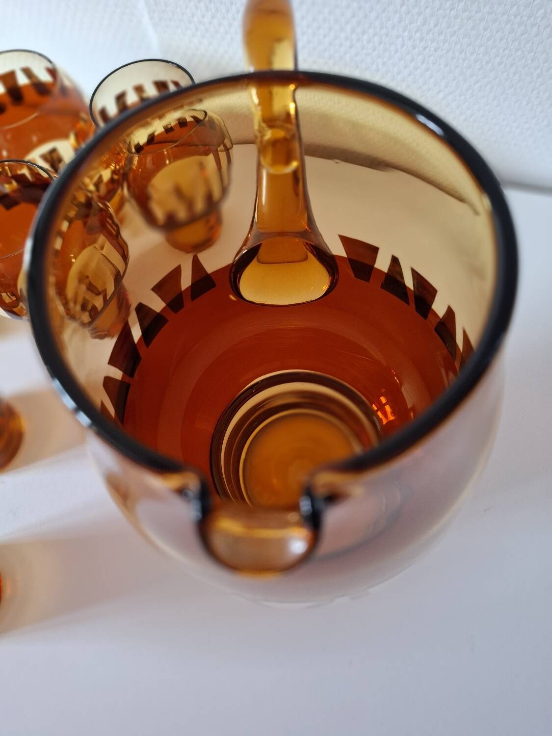 Carafe and its amber/golden glasses from the 70s.