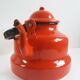 Red enamelled kettle