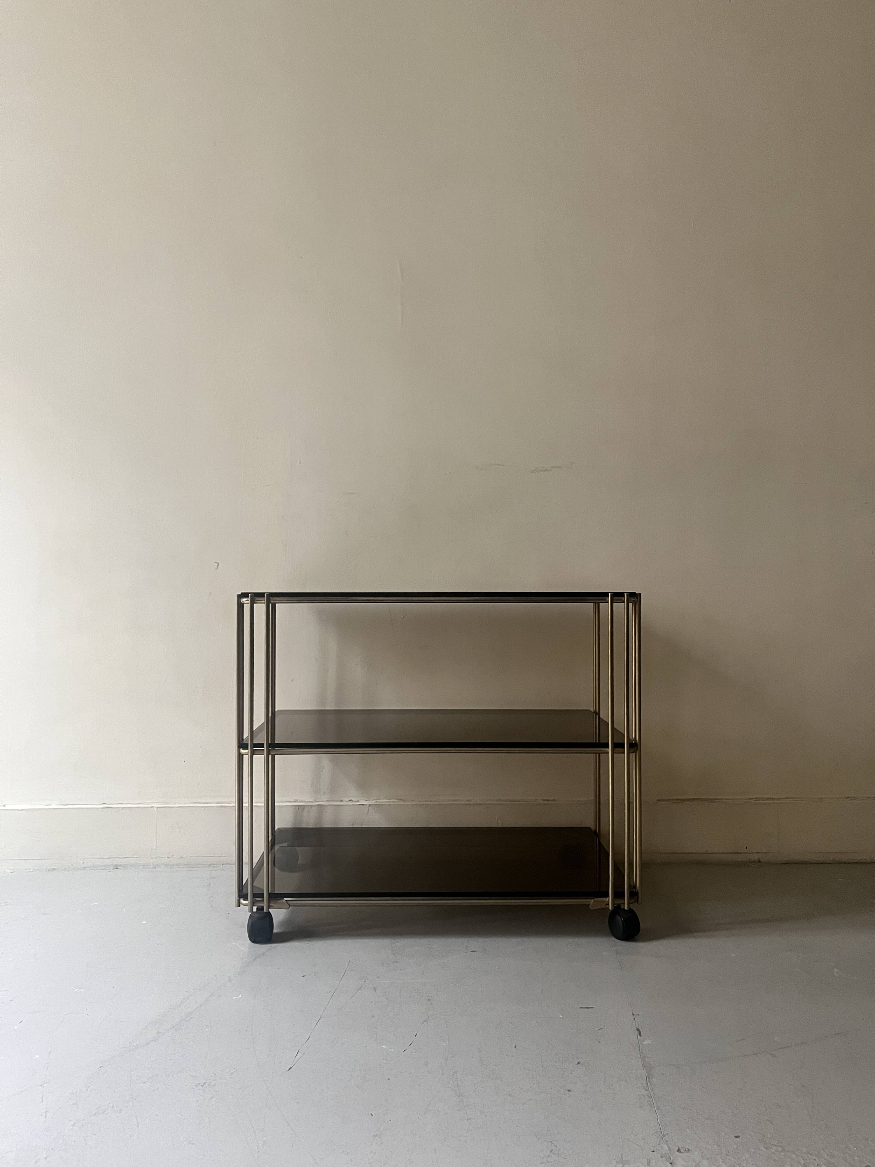 Smoked glass and brass hi-fi/TV stand, circa 1970