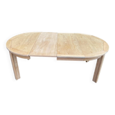 Table à manger scandinave ronde extensible décapée en chêne brut 1970