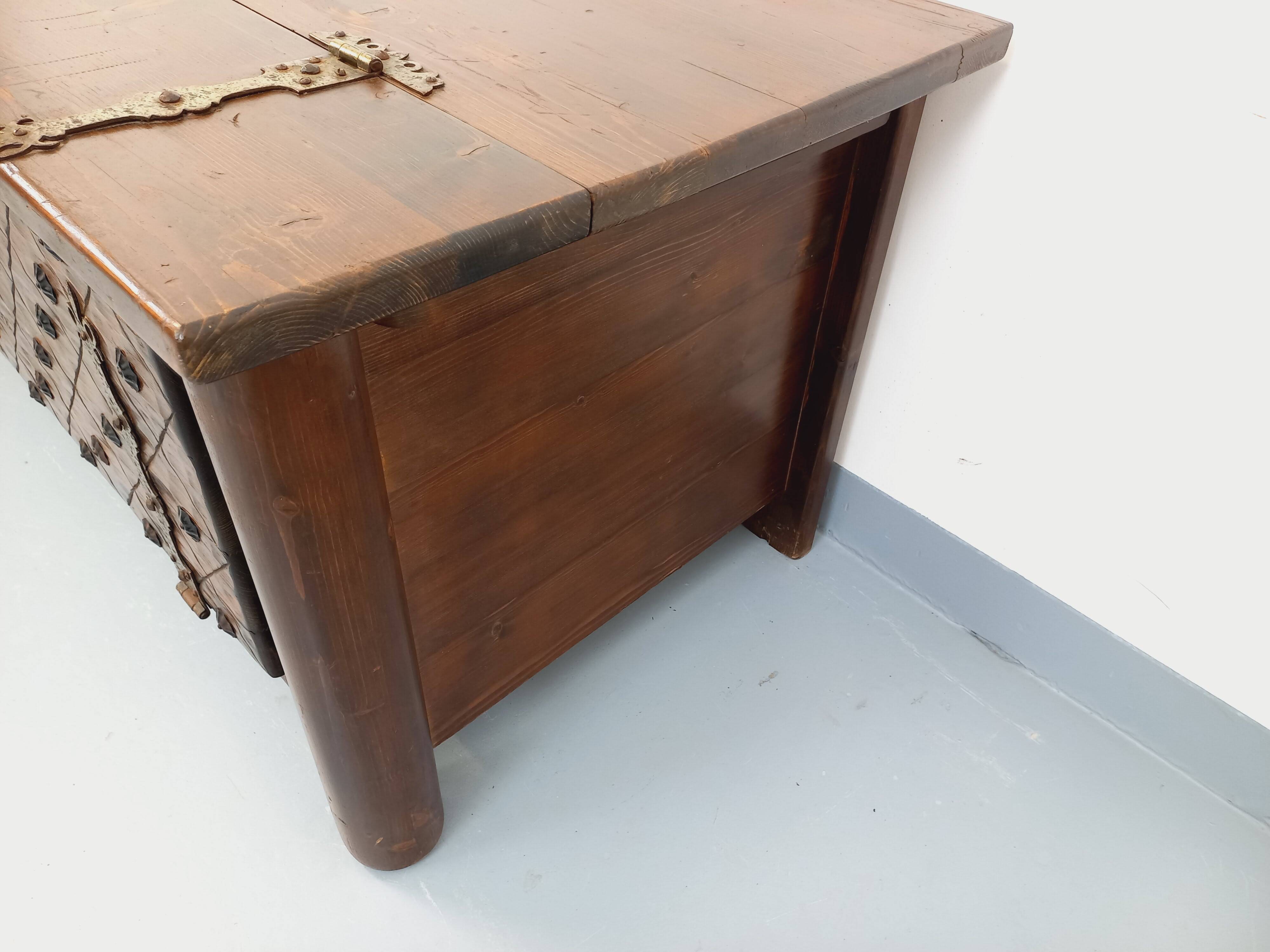 Low brutalist enfilade by Georges Robert in dark pine from the 1960s.